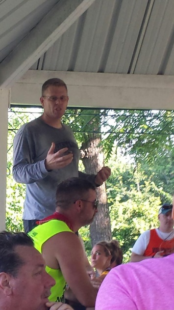 Matt Hartwig, a board member of the Excelsior Springs Educational Foundation, ran in the Waterfest 5K then spoke to runners during the awards ceremony about the work of the foundation.