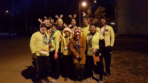 Members of the Fishing River Running Club served as reindeer (and elves) to lead Santa's sleigh in the annual Excelsior Springs Christmas Parade.